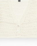 Girls' jacket in white with buttons.