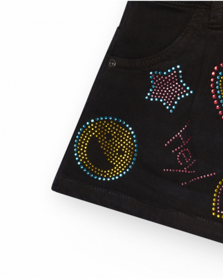 Black shorts for girls decorated with colorful studs.