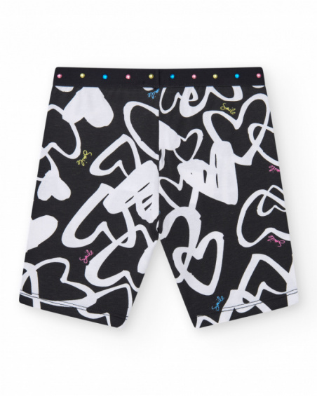 Black cycling leggings for girls with printed hearts and a waistband decorated with studs.