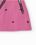 Girl's pink mini skirt with hearts and diagonal zipper