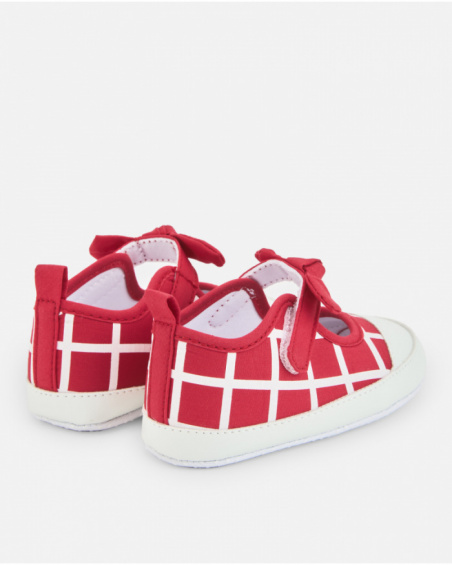 Baby girl Mary Janes in red with checkered pattern and bow detail
