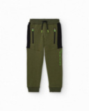 Green jogger pants for boys with black panels and side text Green jogger pants for boys with black panels and side text