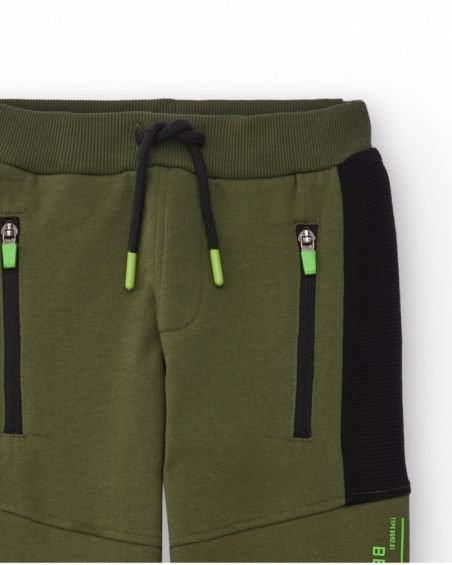 Green jogger pants for boys with black panels and side text Green jogger pants for boys with black panels and side text