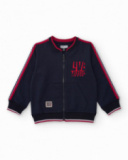 Navy blue bomber jacket for boys with red details and embroidered text Navy blue bomber jacket for boys with red details and embroidered text