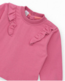 Two-piece set for girl in pink tones with decorative ruffles. Two-piece set for girl in pink tones with decorative ruffles.