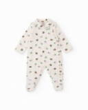 Cotton romper for baby girl with floral print in pastel tones. Cotton romper for baby girl with floral print in pastel tones.