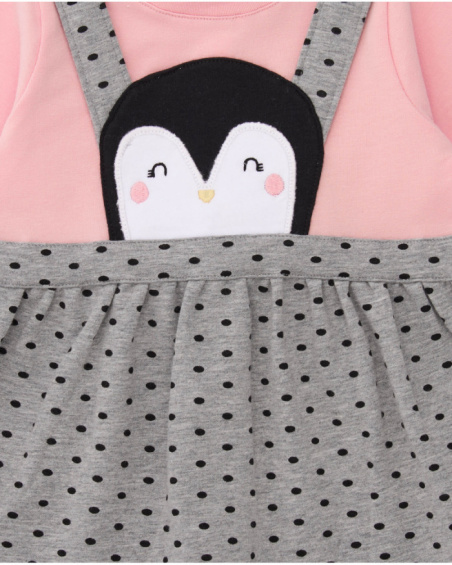 Baby girl dress in pink and grey with polka-dot straps and penguin detail
