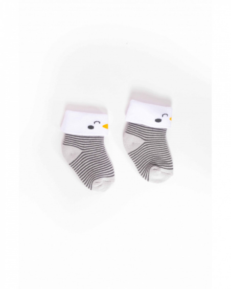 Knit socks for baby boy with grey stripes, white cuff, and penguin detail Knit socks for baby boy with grey stripes, white cuff, and penguin detail