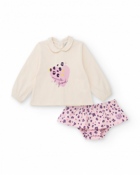 Girl’s outfit with ivory blouse featuring heart print and floral print bloomer shorts. Girl’s outfit with ivory blouse featuring heart print and floral print bloomer shorts.