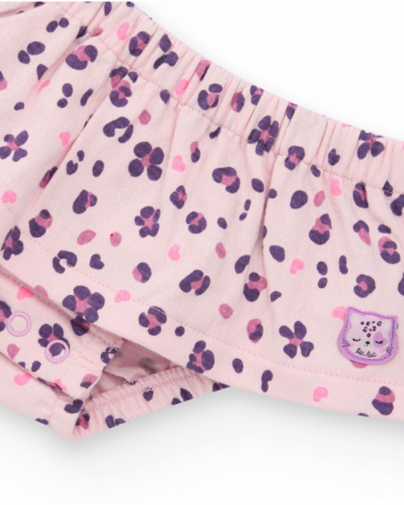 Girl’s outfit with ivory blouse featuring heart print and floral print bloomer shorts. Girl’s outfit with ivory blouse featuring heart print and floral print bloomer shorts.