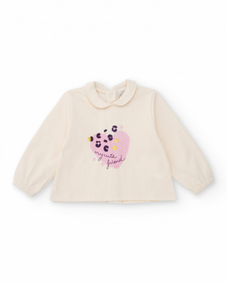Girl’s outfit with ivory blouse featuring heart print and floral print bloomer shorts. Girl’s outfit with ivory blouse featuring heart print and floral print bloomer shorts.