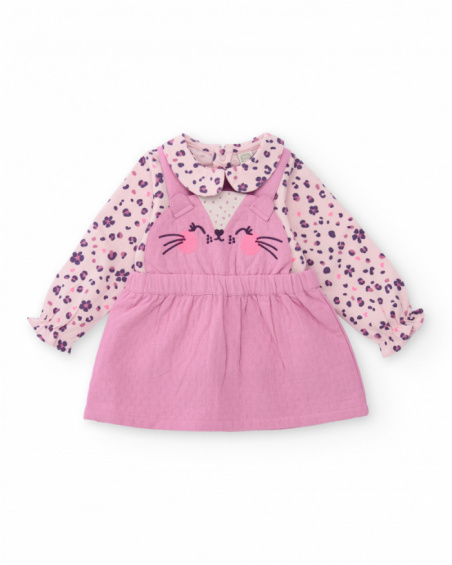 Girl’s outfit with pink dress and floral print blouse. Girl’s outfit with pink dress and floral print blouse.