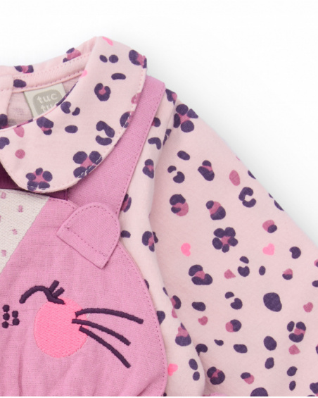 Girl’s outfit with pink dress and floral print blouse. Girl’s outfit with pink dress and floral print blouse.