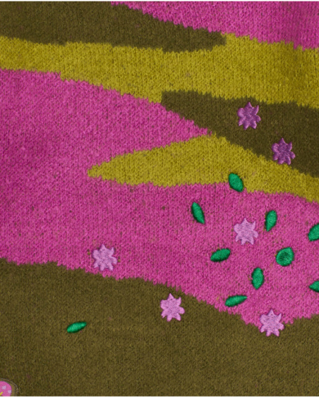 Knit sweater for girls in olive green and fuchsia with embroidered floral details.