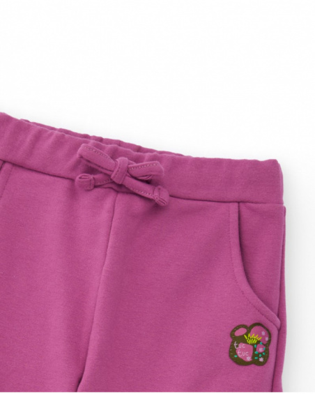 Jogger pants for girls in fuchsia with cargo pockets.