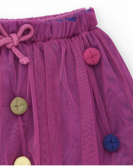Tulle skirt for girls in fuchsia with multicolor button appliqués. Tulle skirt for girls in fuchsia with multicolor button appliqués.