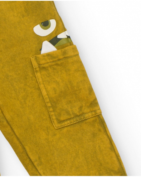 Green jogger pants for boys with fun print on the pocket.