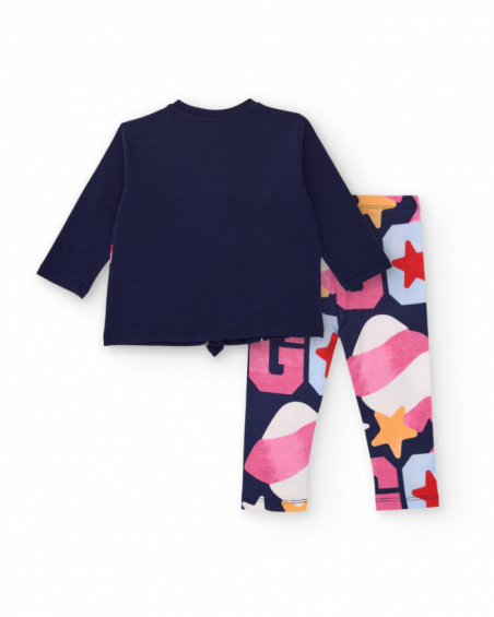 Girl’s outfit with navy blue t-shirt featuring purse appliqué and multicolored printed leggings. Girl’s outfit with navy blue t-shirt featuring purse appliqué and multicolored printed leggings.