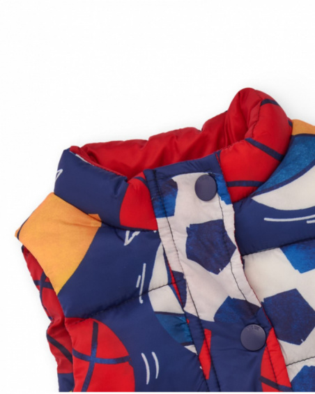 Padded vest for boy with multicolored sports print.