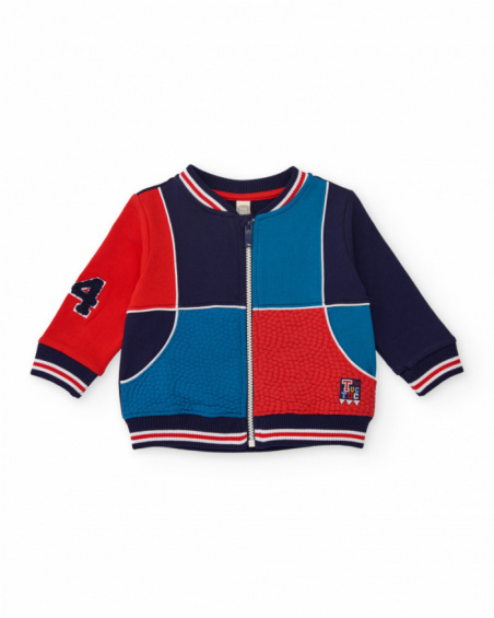 Navy blue fleece jacket for boys with red and blue details.
