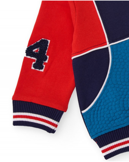 Navy blue fleece jacket for boys with red and blue details.