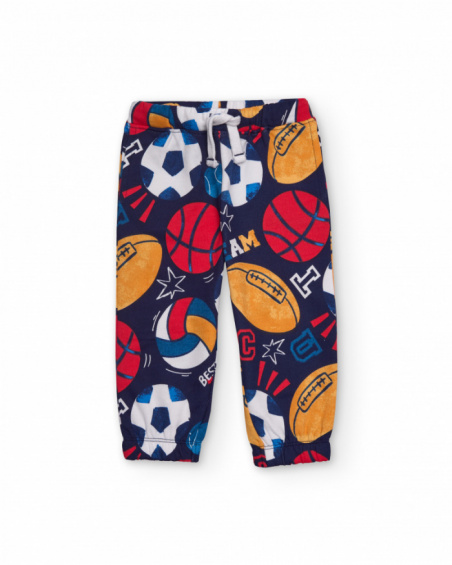Fleece pants for boys in navy blue with multicolor sports print.