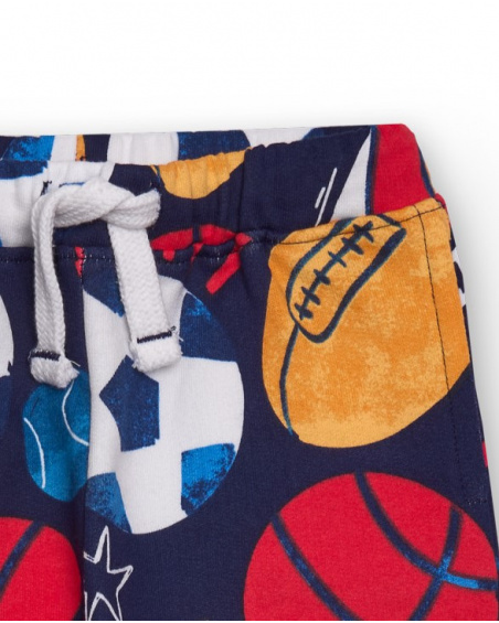 Fleece pants for boys in navy blue with multicolor sports print.