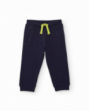 Navy blue knit pants for boy with adjustable waistband and small spaceship embroidery. Navy blue knit pants for boy with adjustable waistband and small spaceship embroidery.