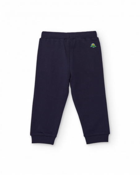 Navy blue knit pants for boy with adjustable waistband and small spaceship embroidery.
