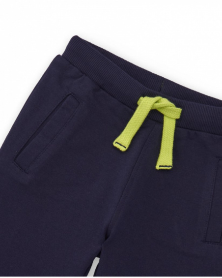 Navy blue knit pants for boy with adjustable waistband and small spaceship embroidery.