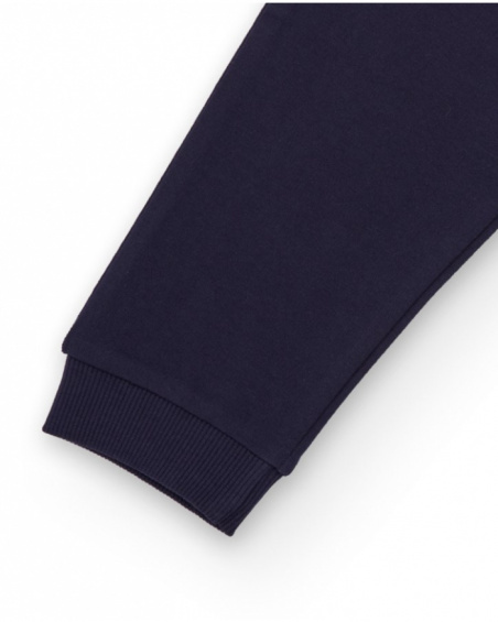 Navy blue knit pants for boy with adjustable waistband and small spaceship embroidery.