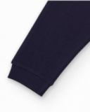 Navy blue knit pants for boy with adjustable waistband and small spaceship embroidery. Navy blue knit pants for boy with adjustable waistband and small spaceship embroidery.