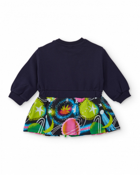 Navy blue dress for girl with planet print and pink bow detail.