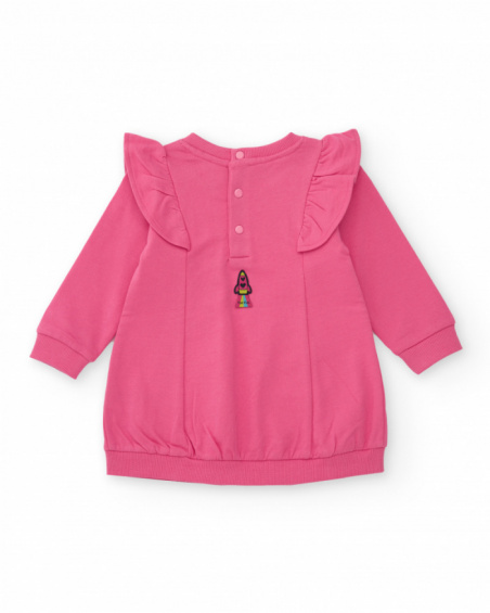 Pink knit dress for girl with star appliqués and shoulder ruffles.