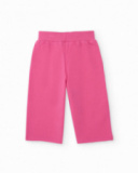 Pink knit pants for girl with printed star detail. Pink knit pants for girl with printed star detail.