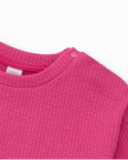 Girls' fuchsia knit sweater with rocket embroidery. Girls' fuchsia knit sweater with rocket embroidery.