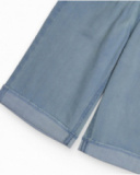 Girls' light blue denim pants with rocket embroidery. Girls' light blue denim pants with rocket embroidery.