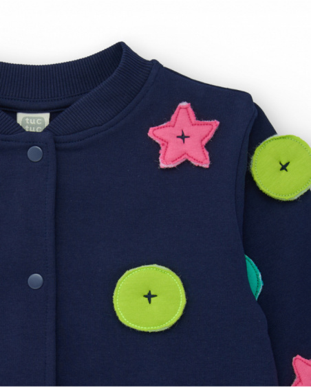 Girls' navy blue knit jacket with star and circle appliqués. Girls' navy blue knit jacket with star and circle appliqués.