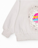 Girls' white fleece sweatshirt with planet sequins. Girls' white fleece sweatshirt with planet sequins.