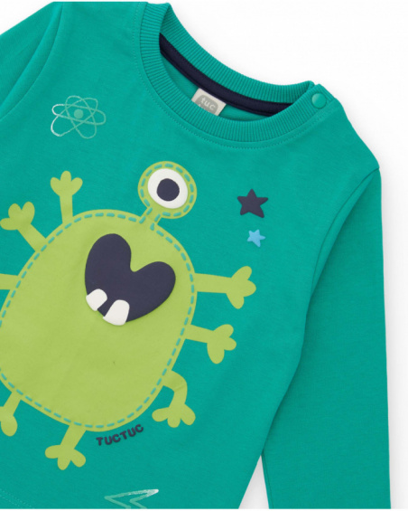 Boys' green knit pajamas with a fun monster print.