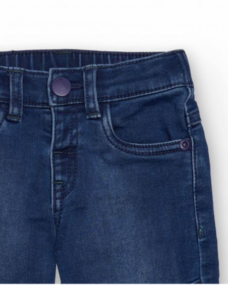 Boys' blue denim pants with dinosaur embroidery. Boys' blue denim pants with dinosaur embroidery.