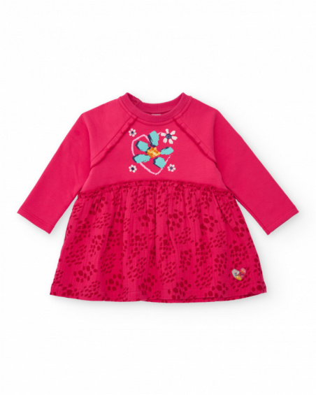 Girls' fuchsia knit dress with heart design and printed skirt. Girls' fuchsia knit dress with heart design and printed skirt.