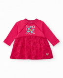 Girls' fuchsia knit dress with heart design and printed skirt. Girls' fuchsia knit dress with heart design and printed skirt.