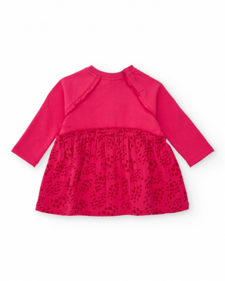 Girls' fuchsia knit dress with heart design and printed skirt. Girls' fuchsia knit dress with heart design and printed skirt.