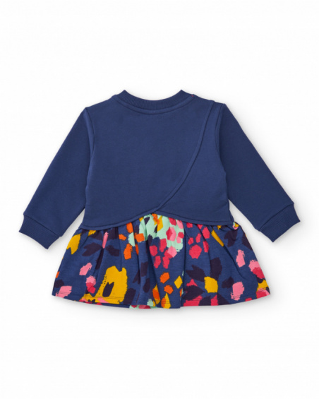Girls' navy blue knit dress with flower appliqué and printed skirt. Girls' navy blue knit dress with flower appliqué and printed skirt.