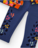Girls' set with sweatshirt and leggings featuring colorful spot and flower print. Girls' set with sweatshirt and leggings featuring colorful spot and flower print.