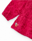 Girls' fuchsia blouse with smocking (honeycomb) detail. Girls' fuchsia blouse with smocking (honeycomb) detail.