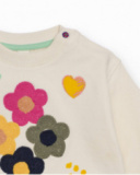 Girls' cream sweatshirt with flower and heart print. Girls' cream sweatshirt with flower and heart print.