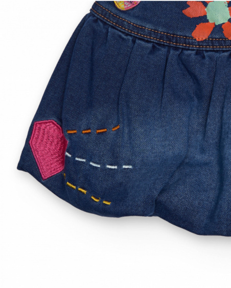 Girls' denim skirt with colorful flower and heart prints. Girls' denim skirt with colorful flower and heart prints.