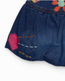 Girls' denim skirt with colorful flower and heart prints. Girls' denim skirt with colorful flower and heart prints.